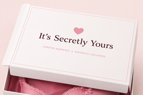 It's Secretly Yours Date Night Box in cream and blush branded packaging